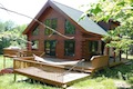 Custom Log Homes Built by Carlton Construction MN.