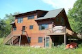 Custom Log Homes Built by Carlton Construction MN.