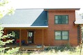 Custom Log Homes Built by Carlton Construction MN.